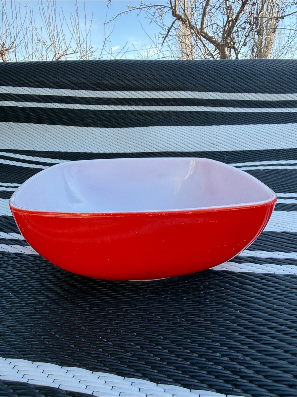 vintage Pyrex red square hostess serving bowl with a 2 1/2 quart capacity